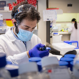 research technician working in CCEH lab